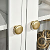 Detailed view of the hardware on the dining buffet cabinet. 
