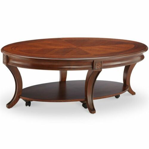Winslet oval coffee table with saber legs and casters. 