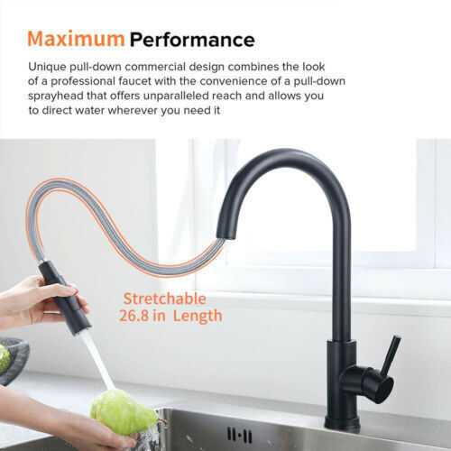Demonstration of the pull down sprayer function of the kitchen faucet.