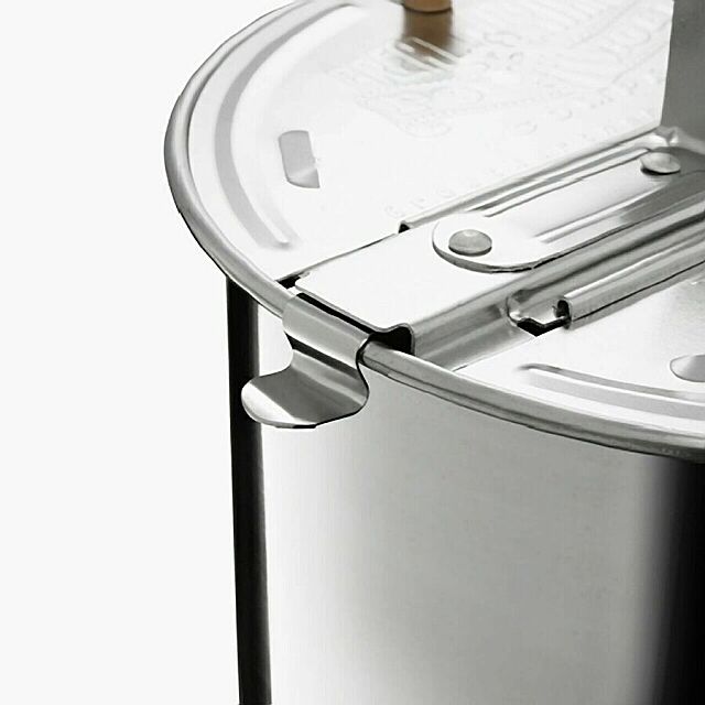 Detail of popcorn popper lid with clip.