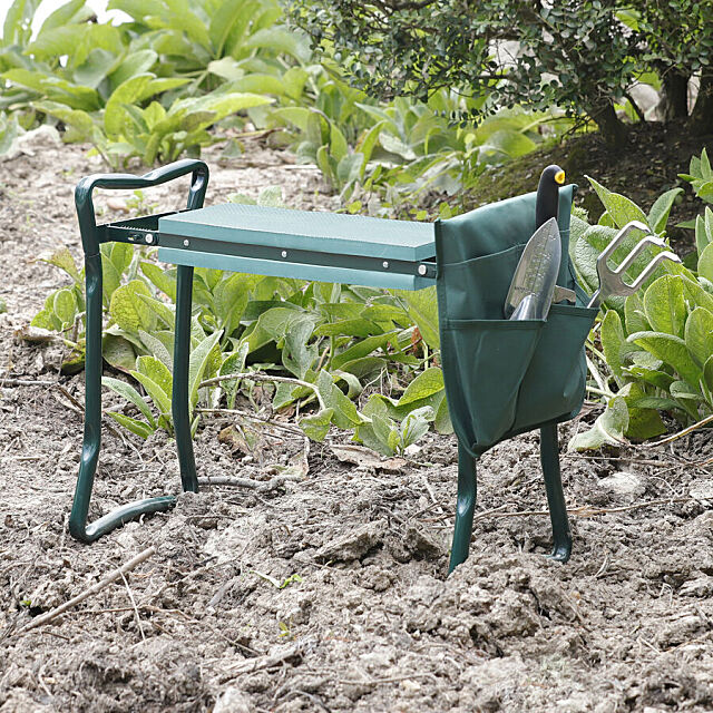 Padded garden stool in the garden with the tool pouch attached. 